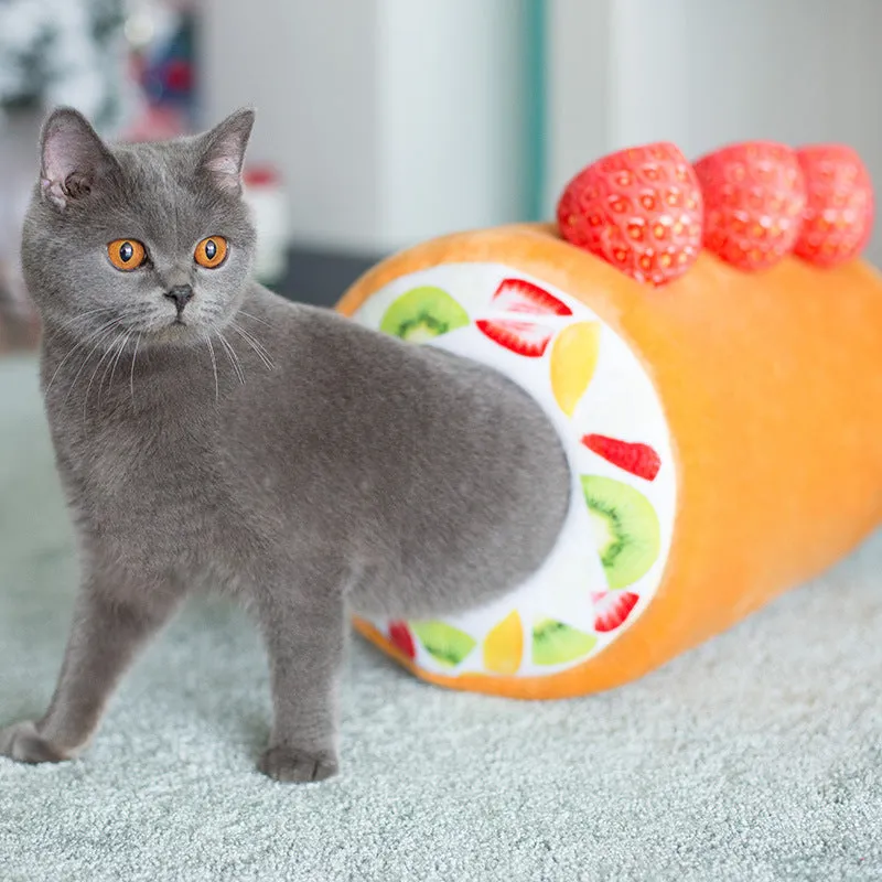 Yellow cake roll plush cat toy 40cm long on plain background