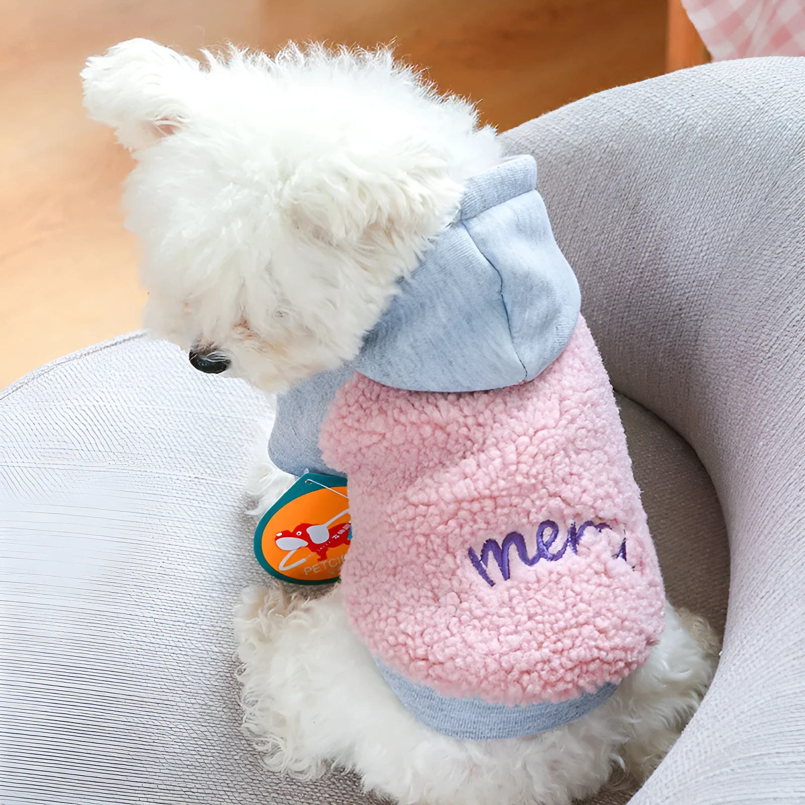 Warm hoodie sweet pet clothing in black polyester with two legs and a hood for small to medium dogs.