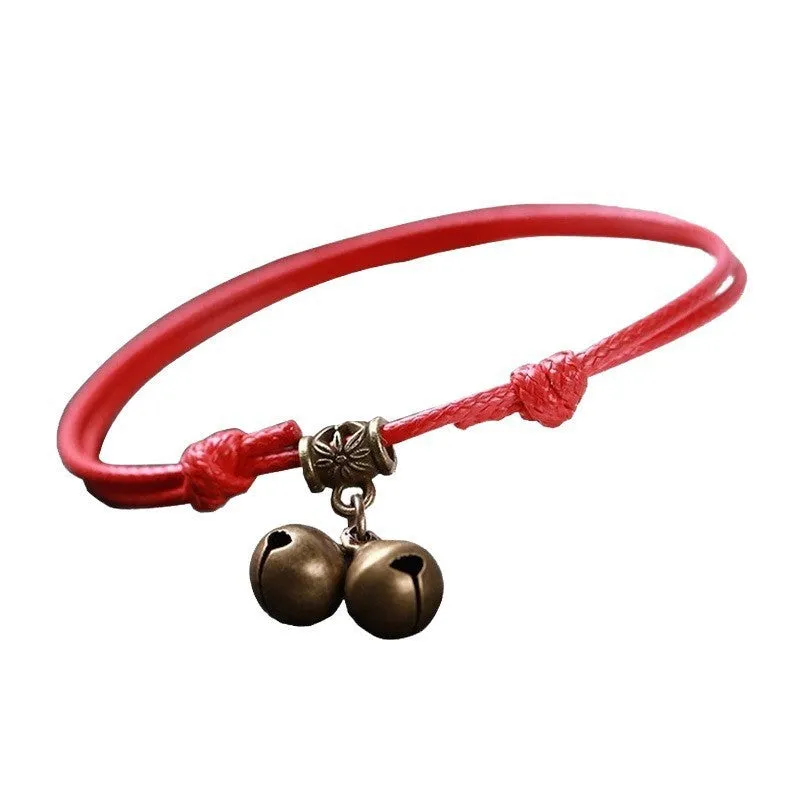 Adjustable nylon dog collar with brass bell or buckle in black, red, or coffee rope colour.