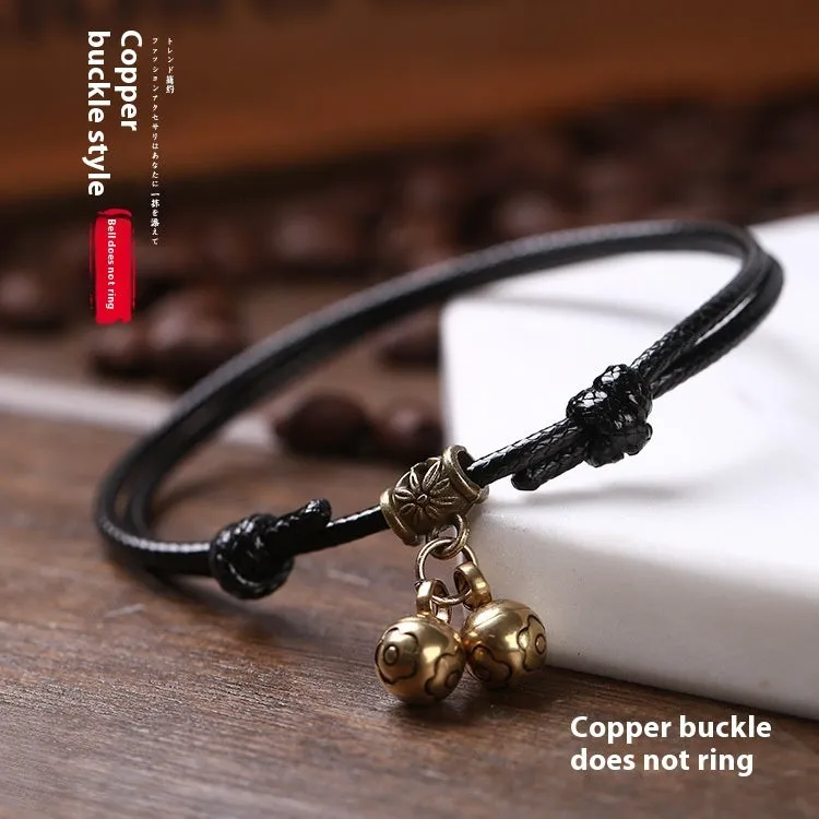 Adjustable nylon dog collar with brass bell or buckle in black, red, or coffee rope colour.
