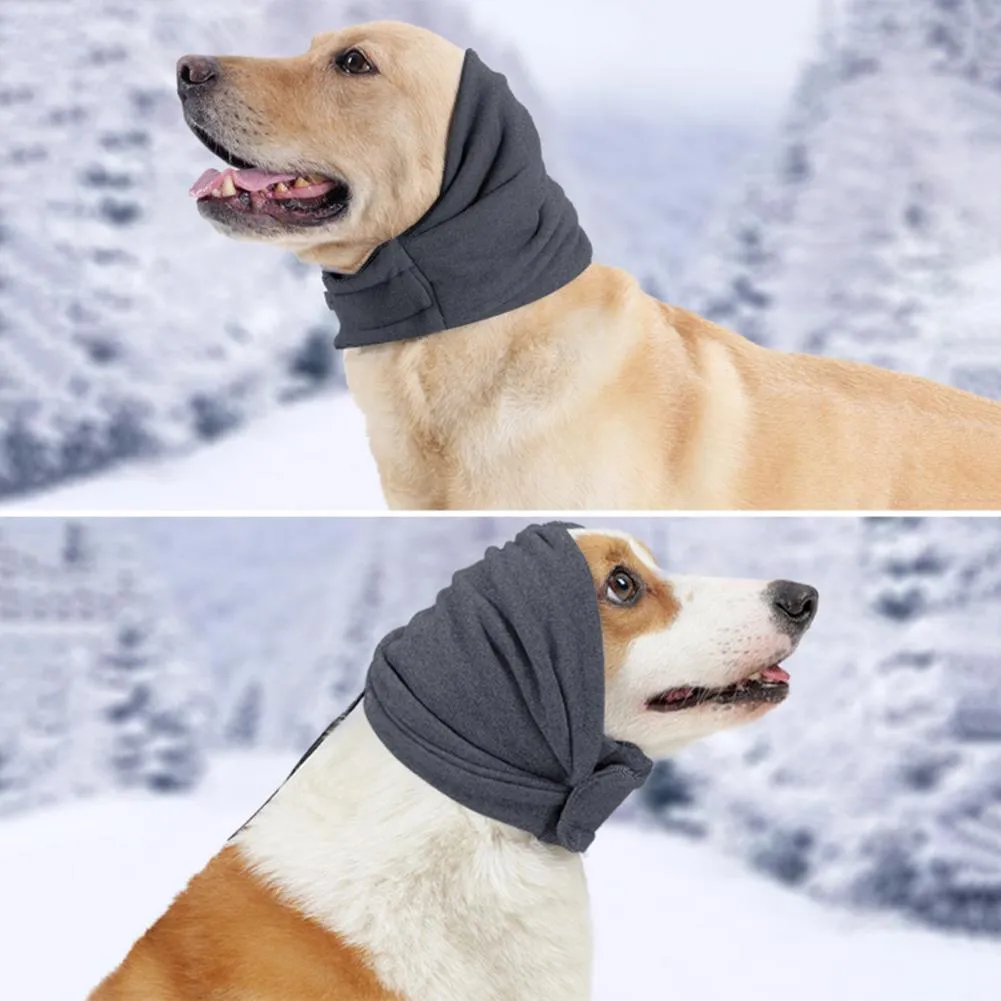 Dog wearing purple calming hoodie with ear muffs covering head and neck