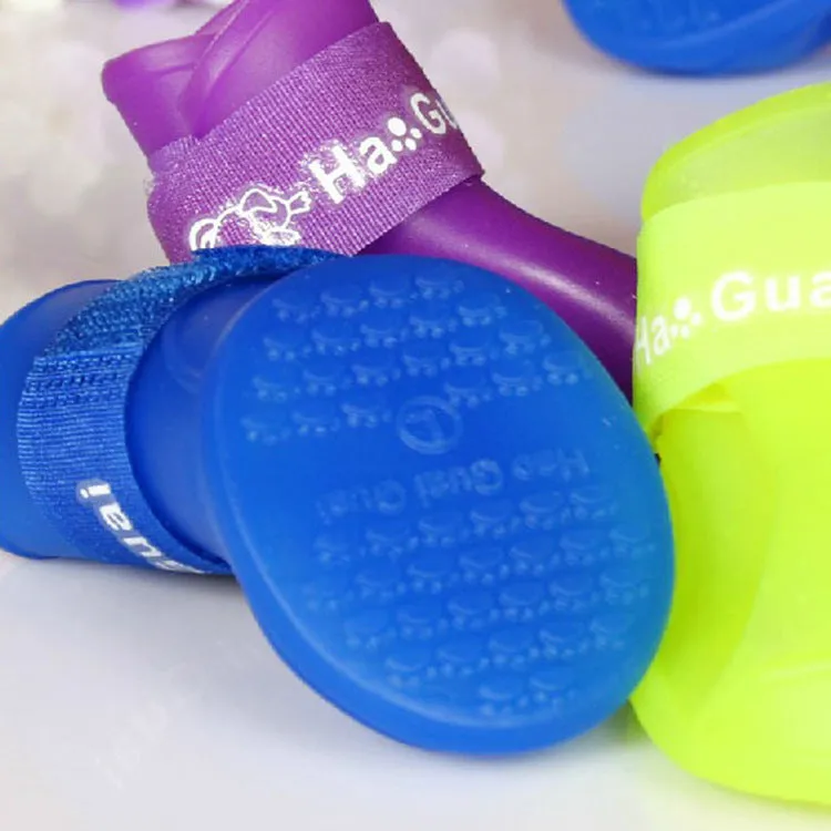 Soft non-slip silicone pet rain boots in purple for dogs, waterproof with wear-resistant sole, available in sizes S M L
