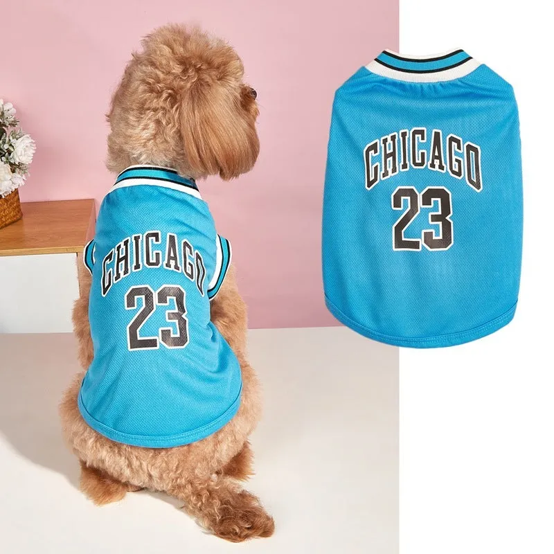 Dog wearing a black mesh polyester basketball vest with number 23 print, side view