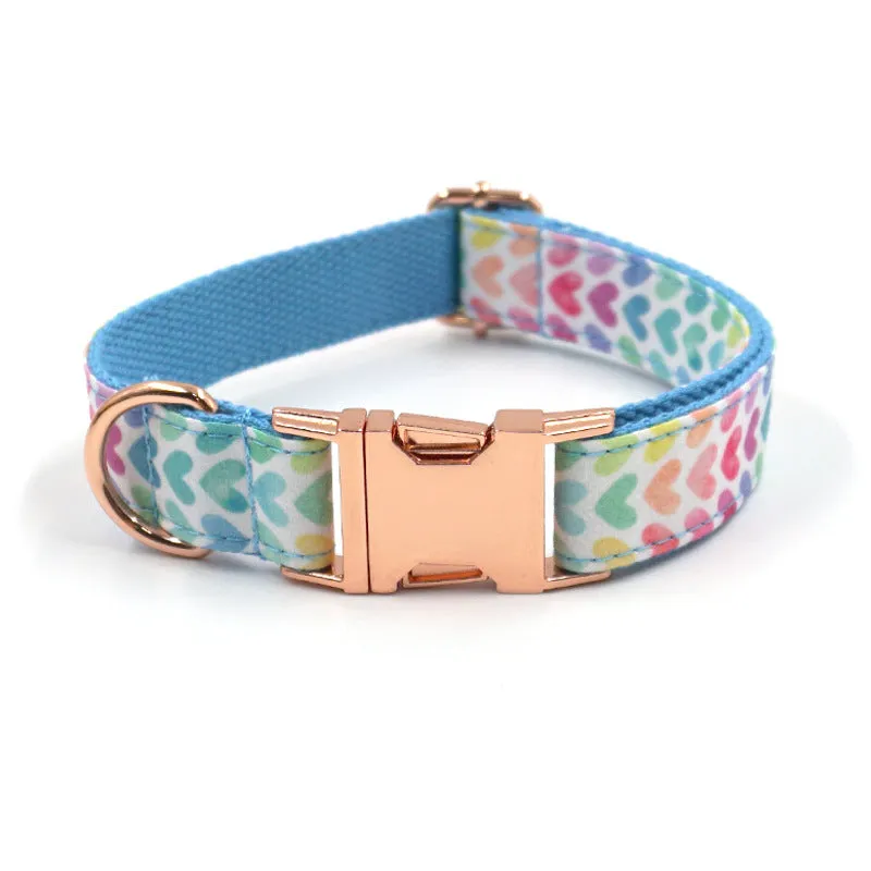 Rose gold cloth adjustable dog collar and lead rope set on a dog