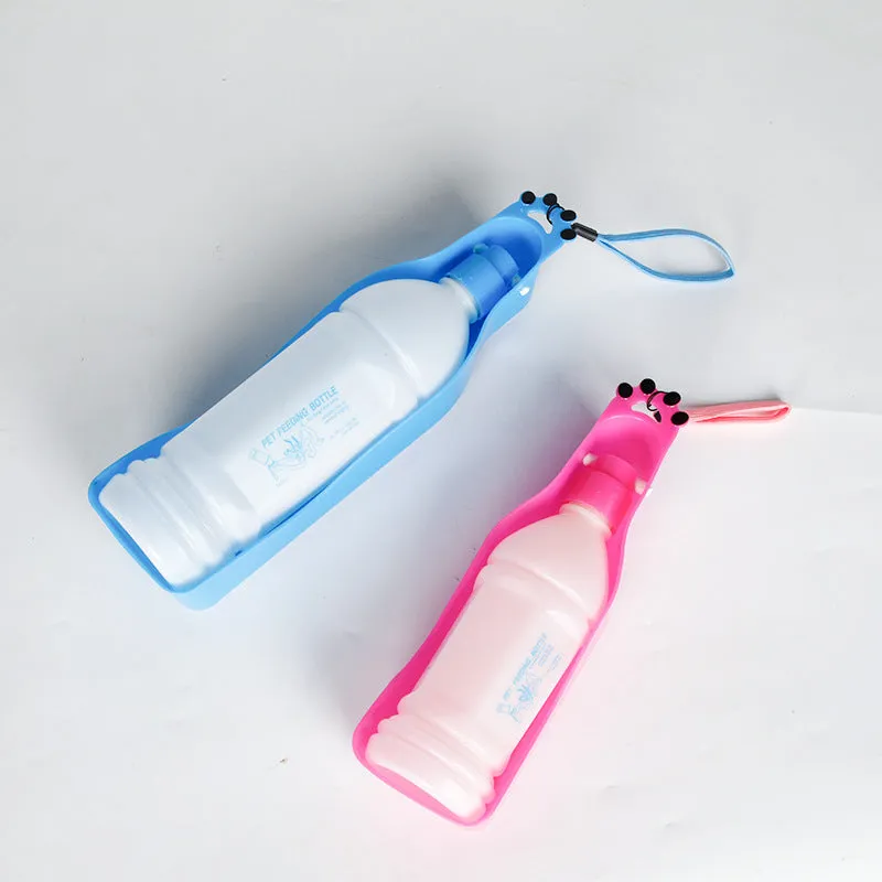 Blue portable pet cup drinker with stretch cover and 600ml capacity, shown on outdoor background