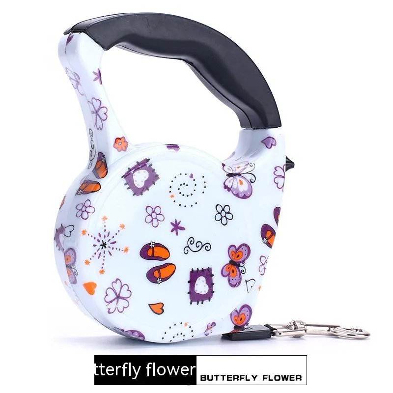 Automatic retractable dog leash with plastic housing and 5 metre long 1cm wide patterned band