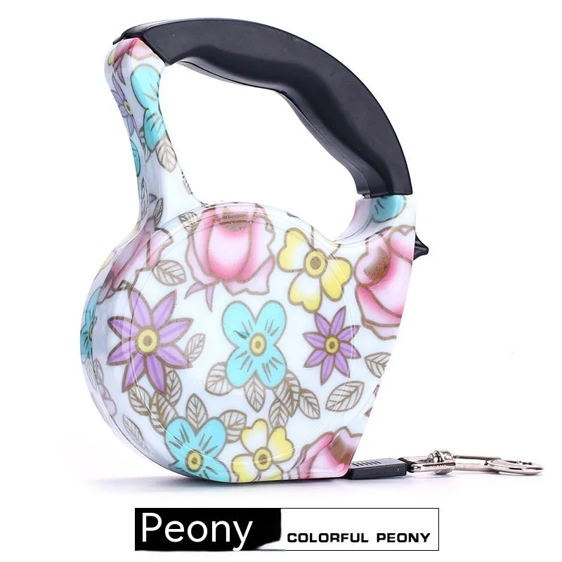 Automatic retractable dog leash with plastic housing and 5 metre long 1cm wide patterned band