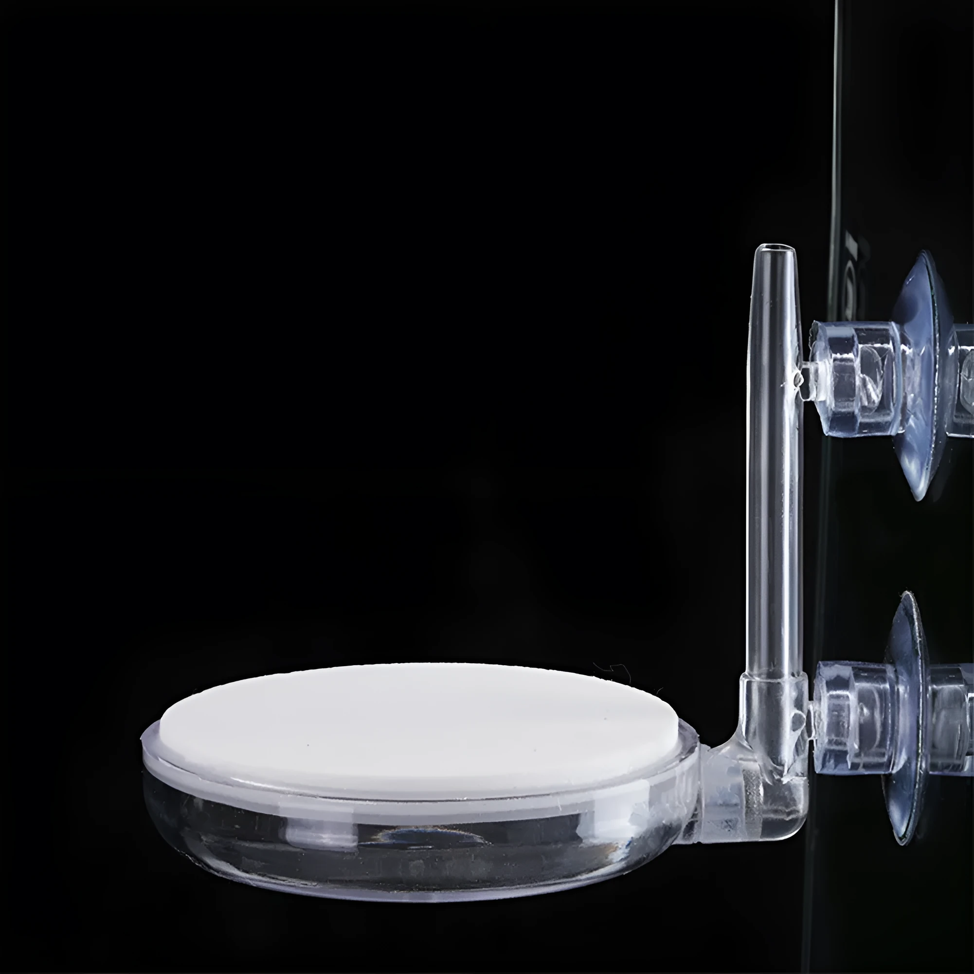 White transparent PC aquarium air refiner with nano bubbles and suction cups, shown on glass tank