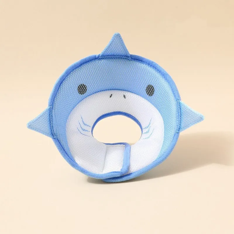 Pet protective cover in blue shark cartoon pattern, made from mesh cloth, on a light background