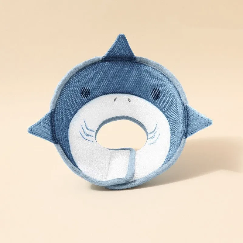 Pet protective cover in blue shark cartoon pattern, made from mesh cloth, on a light background