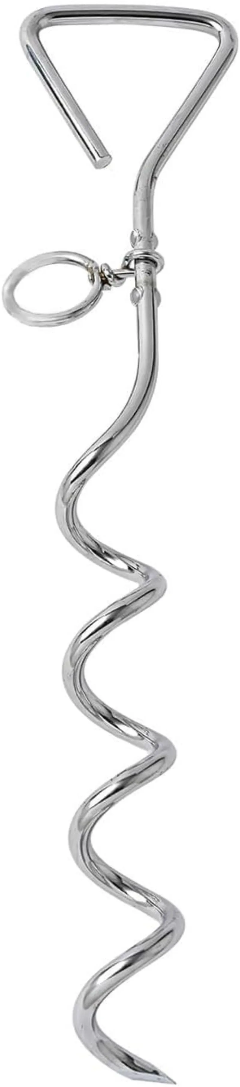 Silver spiral dog tie out stake made of steel, shown screwed into sandy ground with a leash attached.