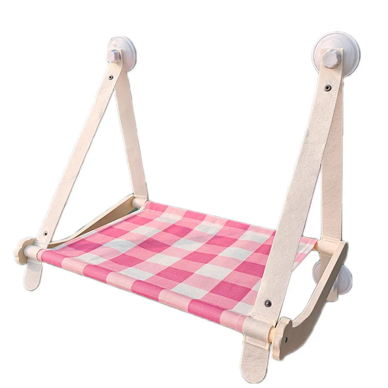 Wooden cat window hammock bed with suction cups mounted on glass, linen mat in green colour