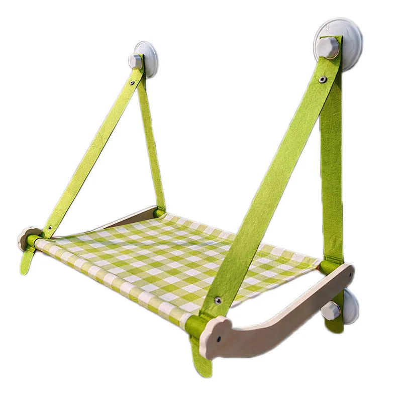 Wooden cat window hammock bed with suction cups mounted on glass, linen mat in green colour