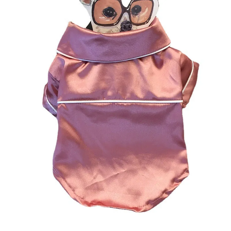 Fashion Personality Teddy Dog Clothing in pink pajamas style for a small dog, made from polyester, on a plain background