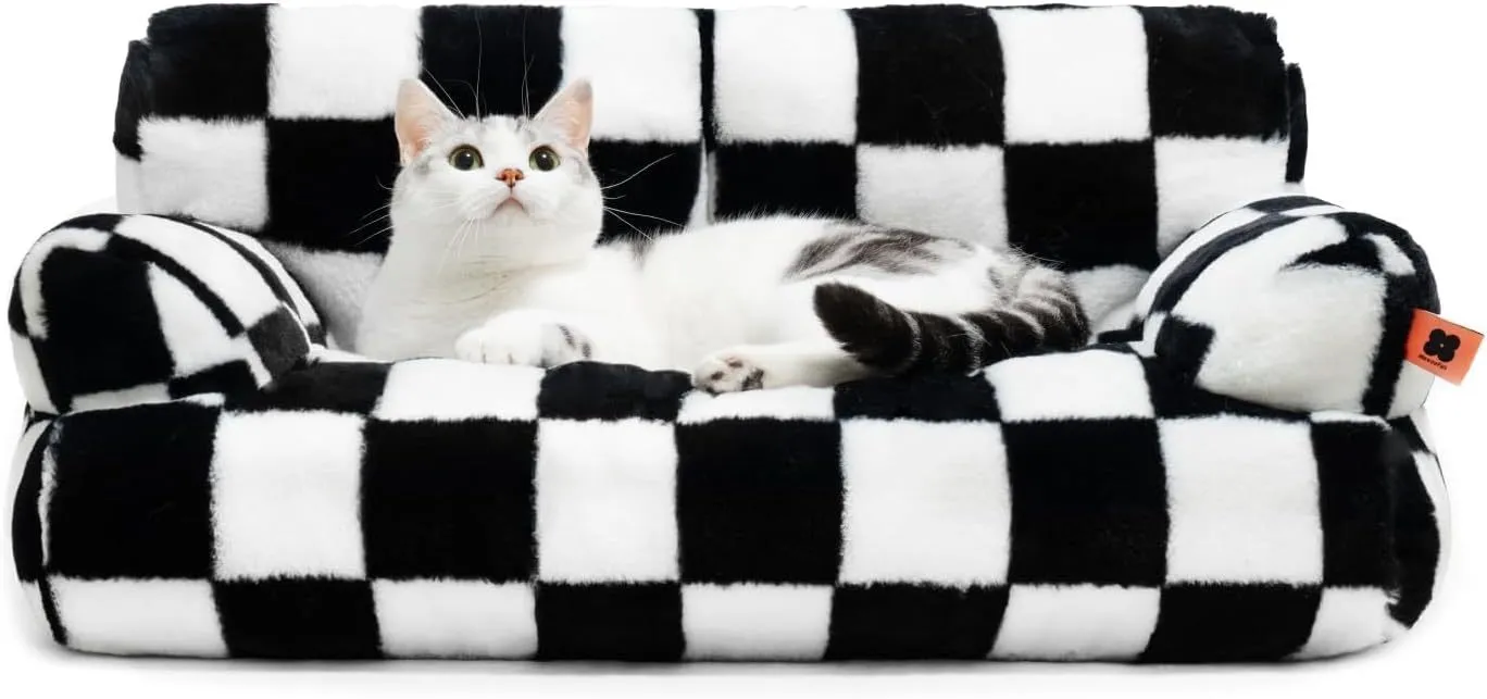 Fluffy cat couch bed in black and white with raised sides and non-slip base for cats and small dogs