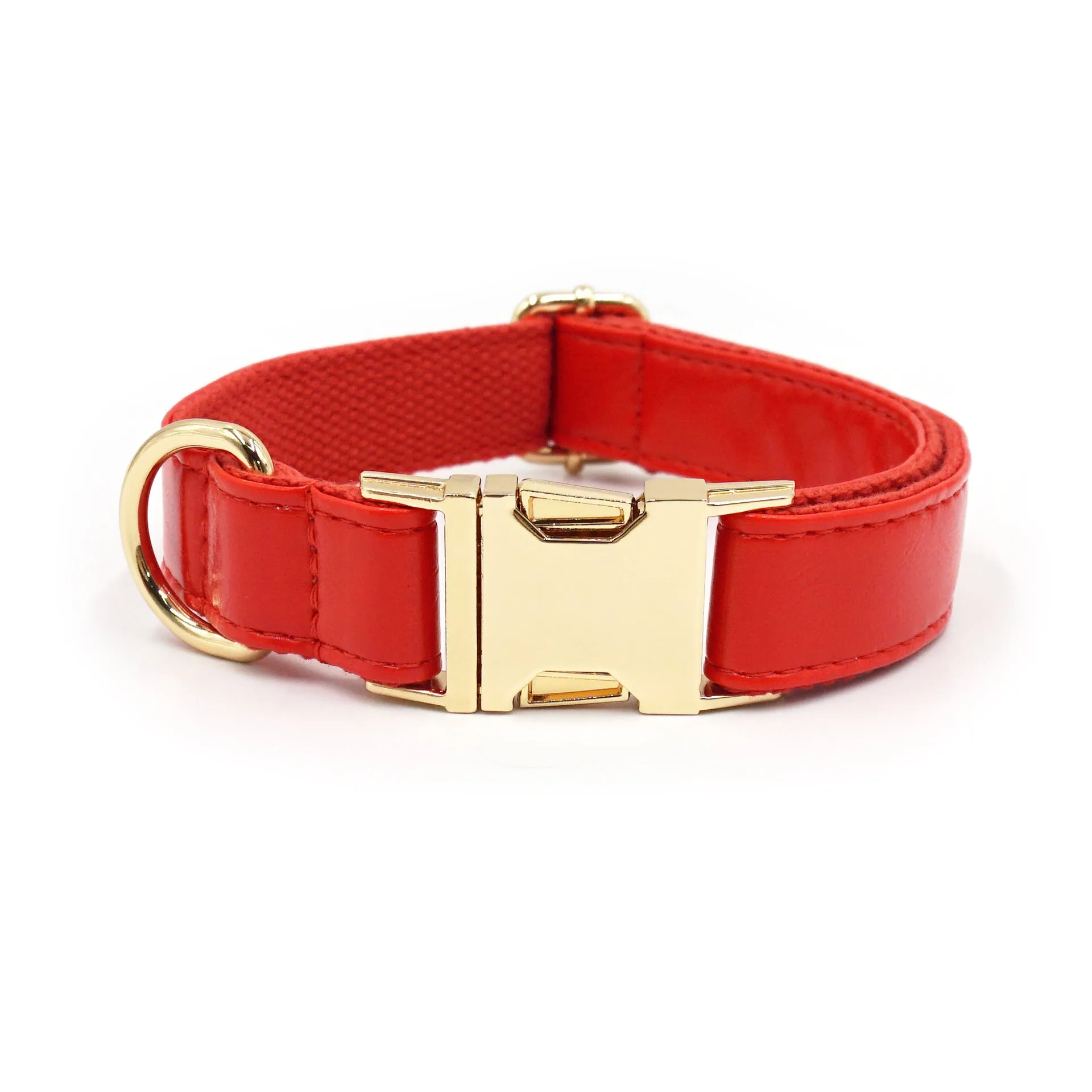 Leather dog collar with velvet texture section in colour block design, shown on a buckle.