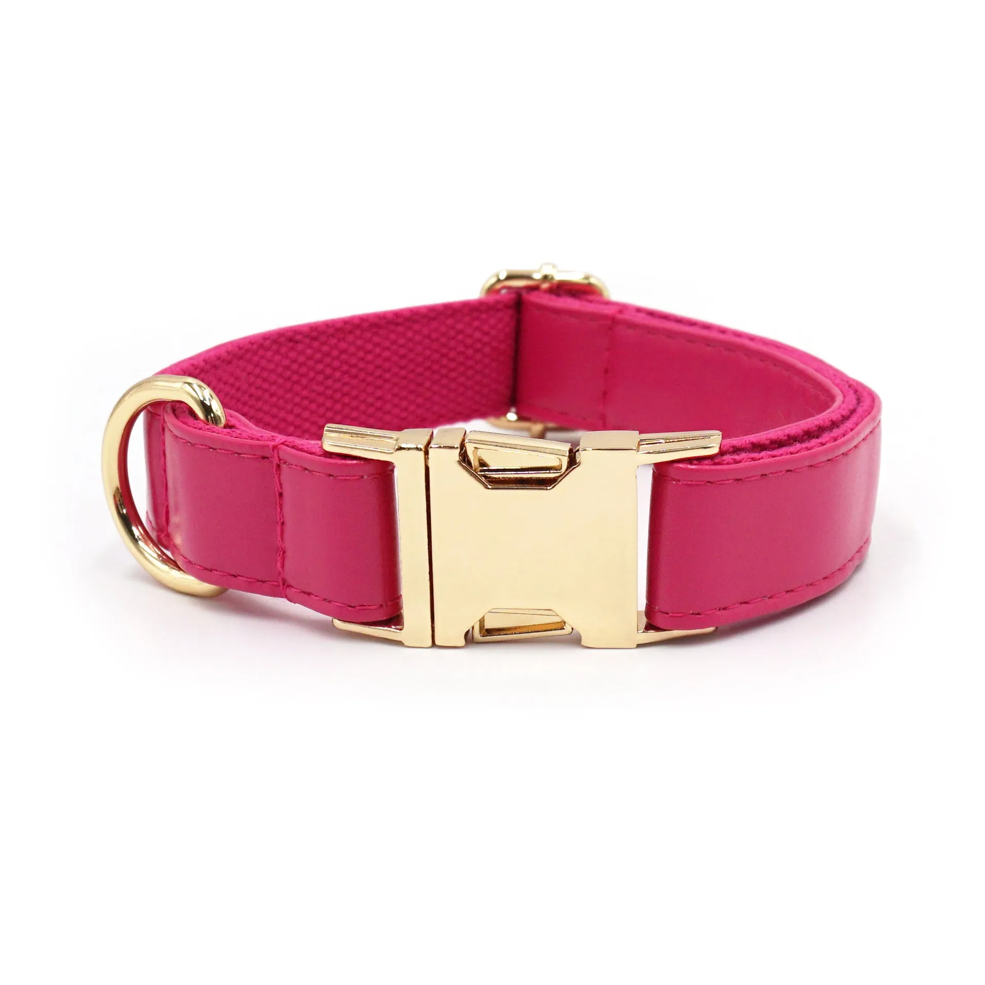 Leather dog collar with velvet texture section in colour block design, shown on a buckle.