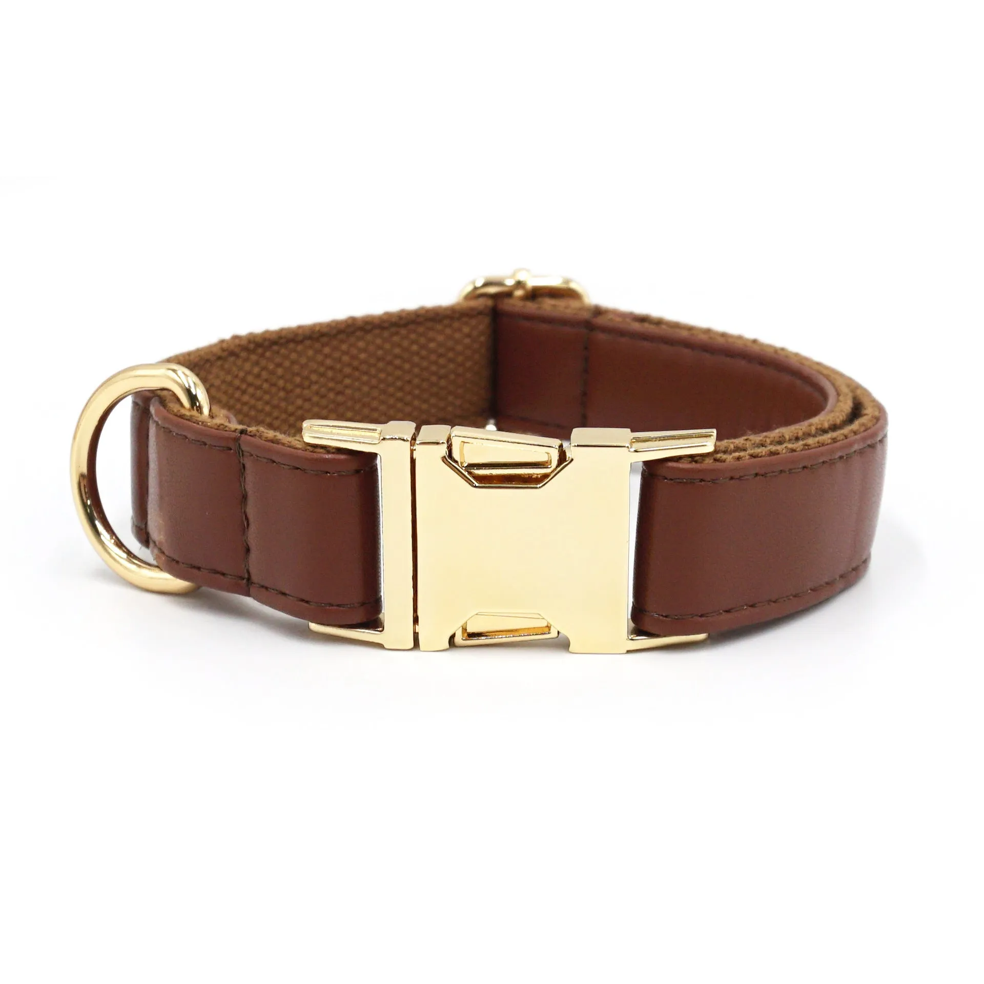 Leather dog collar with velvet texture section in colour block design, shown on a buckle.