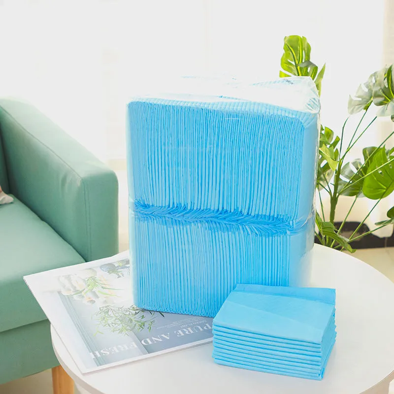 Pack of disposable pet urine pads showing different sizes and the bamboo charcoal deodorising model.