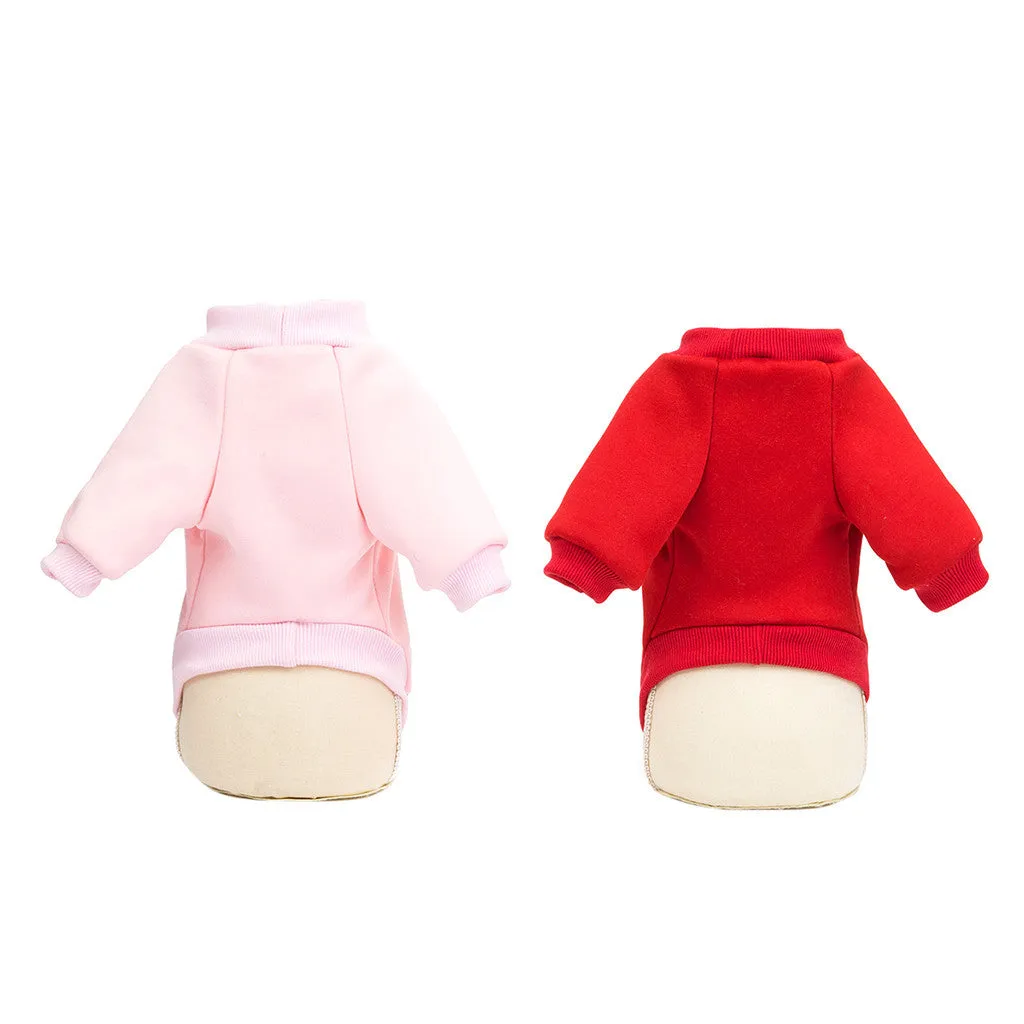 Cartoon fashion cotton dog sweater in pink, showing playful print and knit texture for small pets
