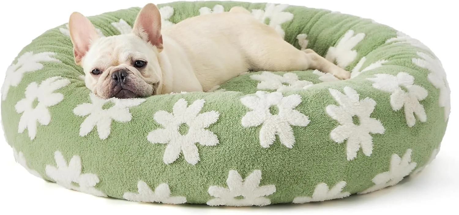 Round plaid dog bed with a raised edge on a plastic base, shown in a sea blue and white colour.