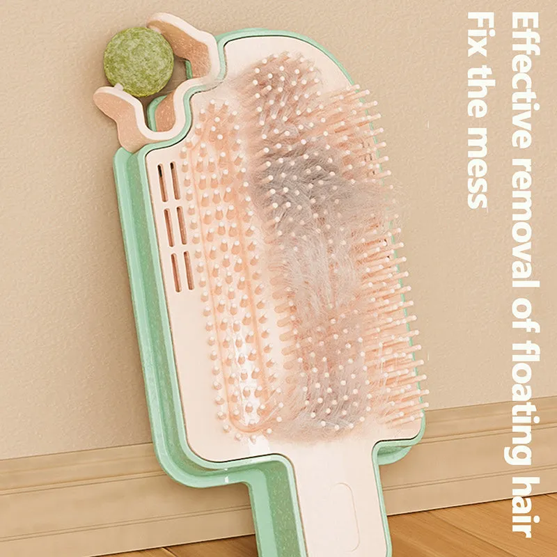 Ice cream-shaped cat scratching toy with corner rubbing post, mint ball, and feather attachment on white background.