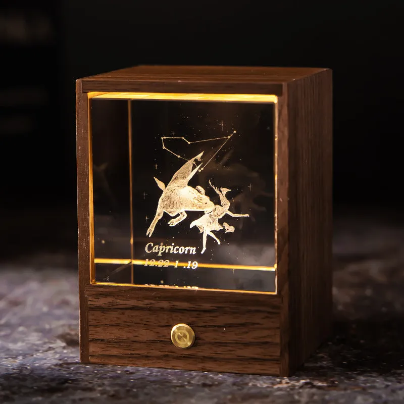Crystal LED table lamp with black walnut base and K9 crystal showing constellation night light effect