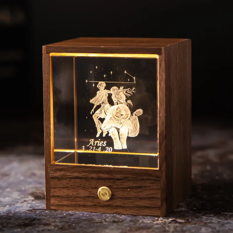 Crystal LED table lamp with black walnut base and K9 crystal showing constellation night light effect