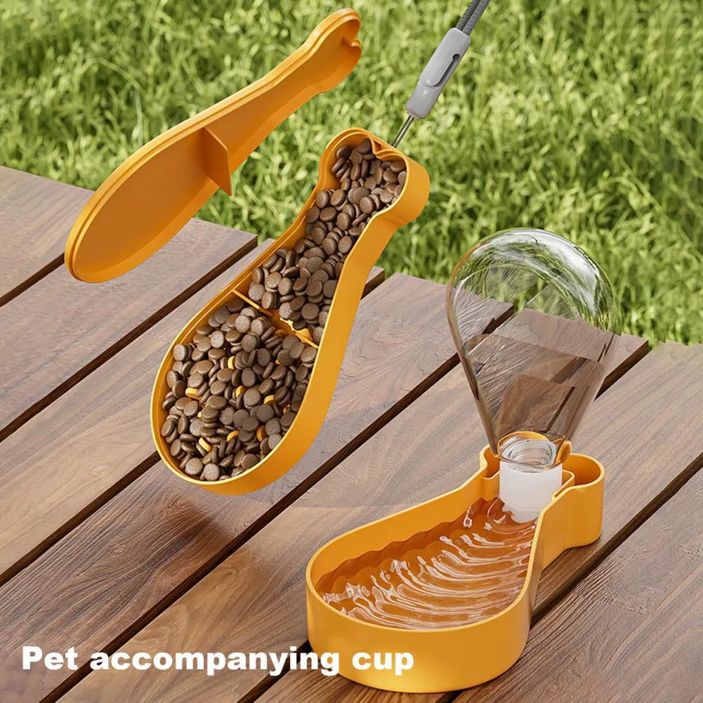 Orange and white portable pet water bottle with attached food container for dogs and cats