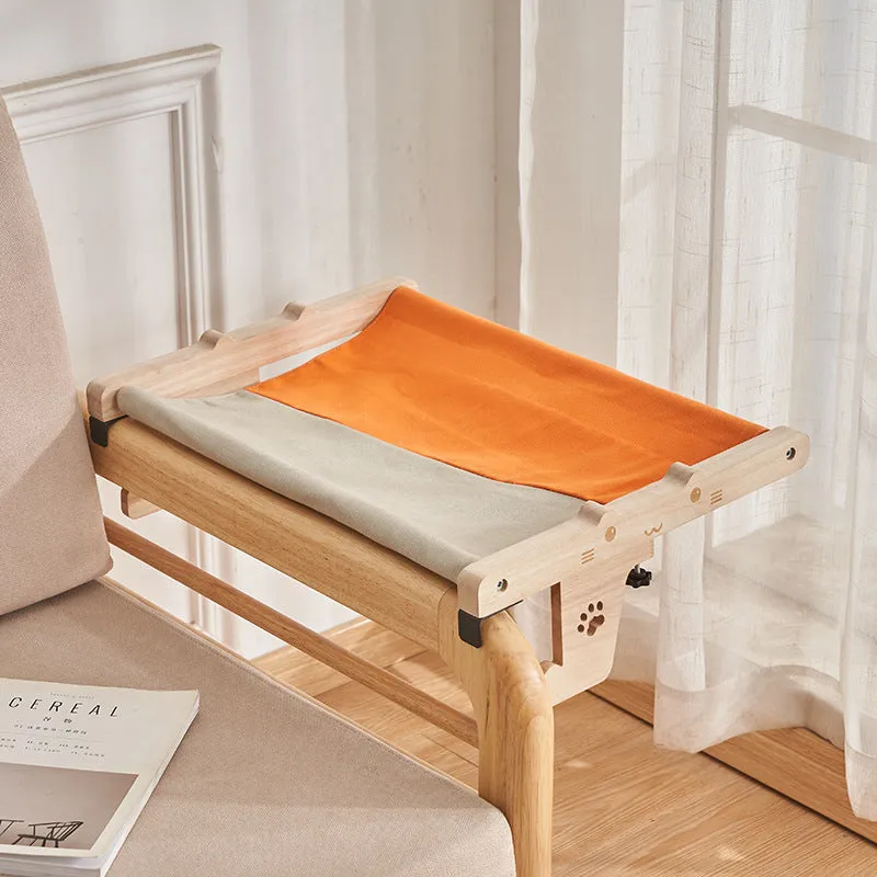 Wooden framed cat hanging hammock bed mounted on a window sill, available in seven style variations.