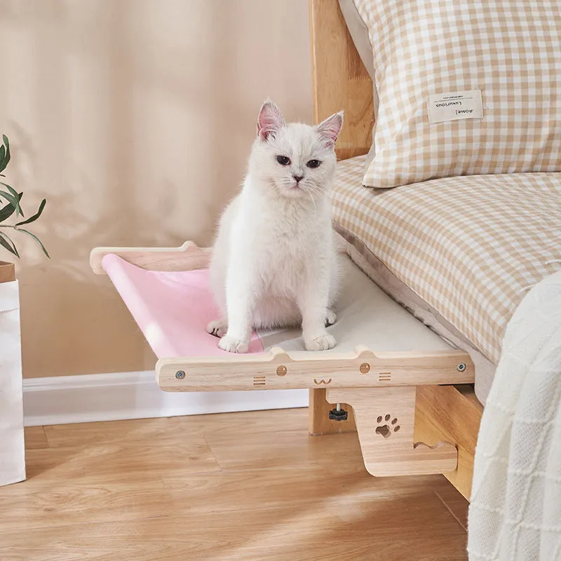 Wooden framed cat hanging hammock bed mounted on a window sill, available in seven style variations.
