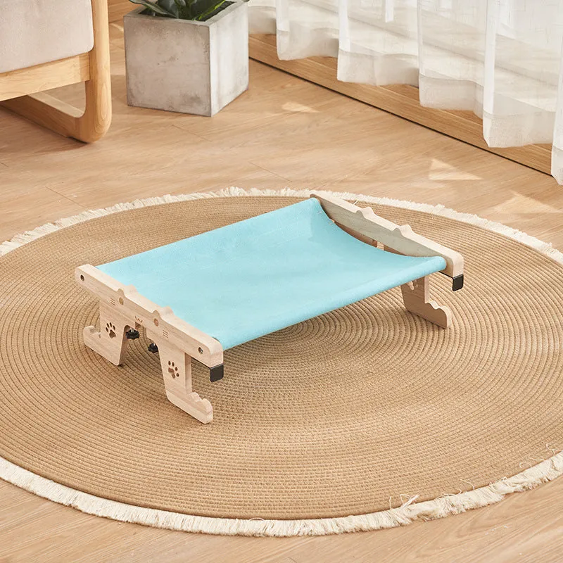 Wooden framed cat hanging hammock bed mounted on a window sill, available in seven style variations.