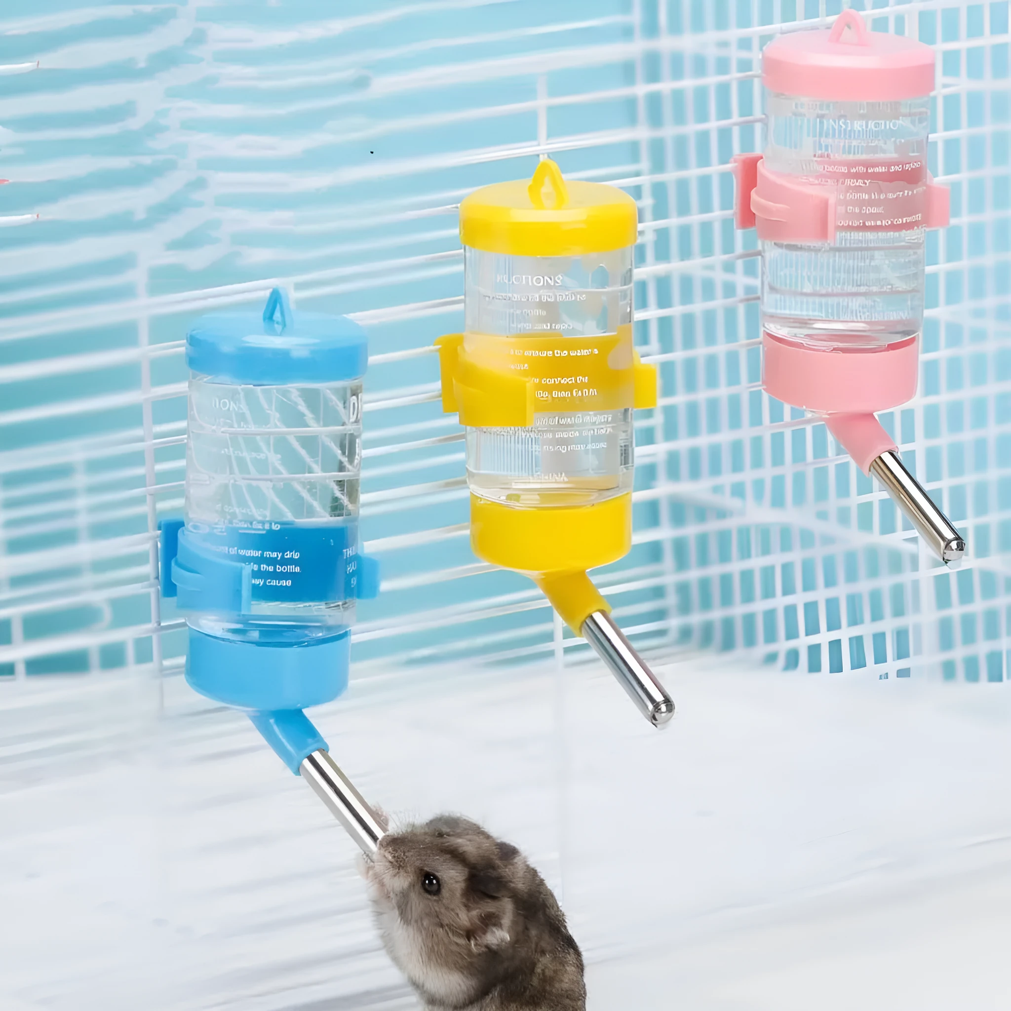 Green ball kettle leak-proof water feeder for small pet cages, shown with a 60ml glass tube.