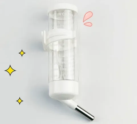 Green ball kettle leak-proof water feeder for small pet cages, shown with a 60ml glass tube.