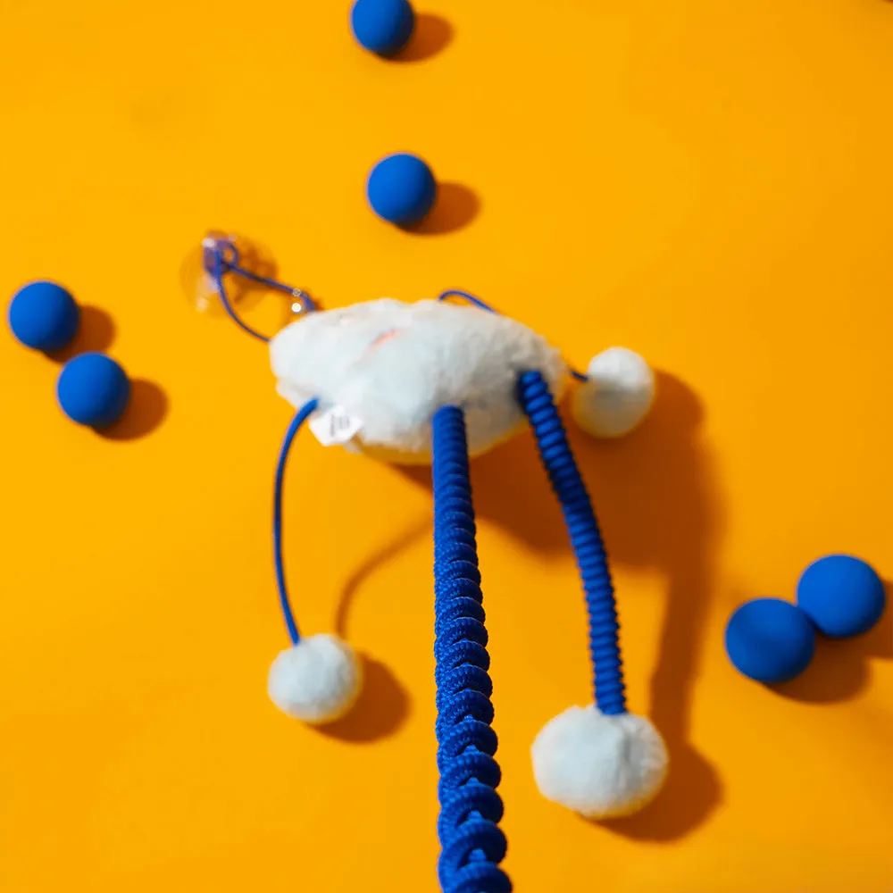 Blue plush ring cat toy with mint bell on an elastic rope