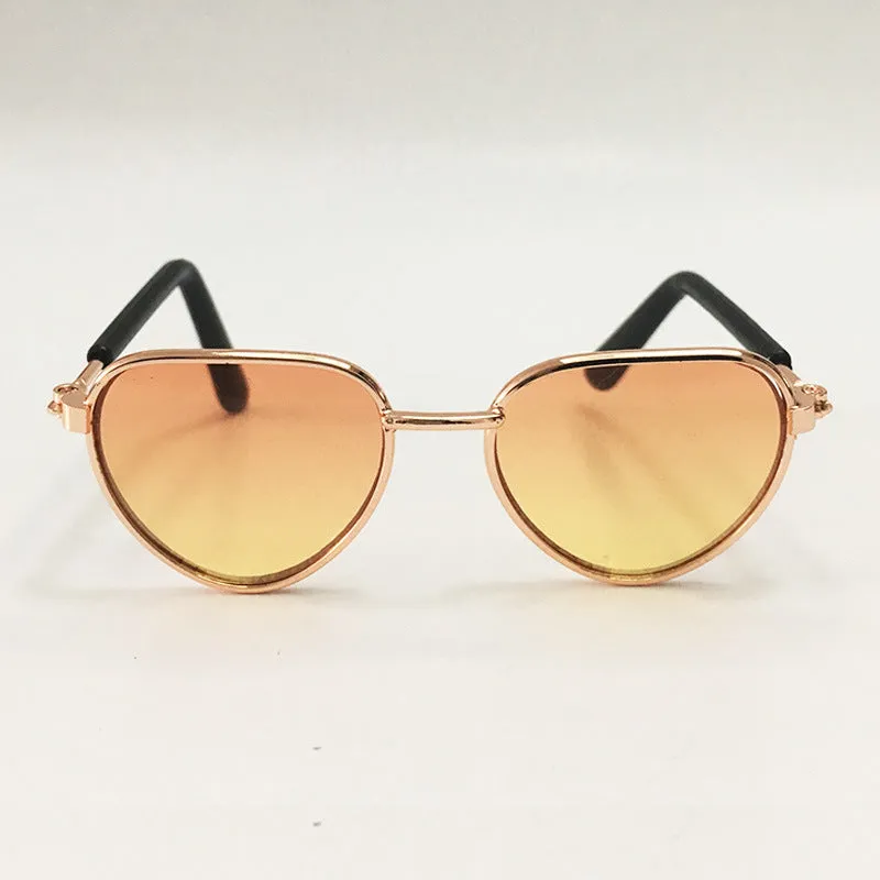 Creative fashion mini pet cat sunglasses with metal frame, spring temples, and round lenses in a colourful style