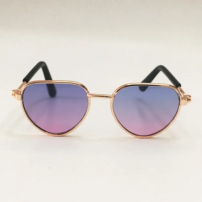 Creative fashion mini pet cat sunglasses with metal frame, spring temples, and round lenses in a colourful style
