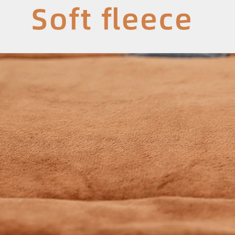 Self-heating pet mat in brown with soft fleece surface and non-slip base on wooden floor