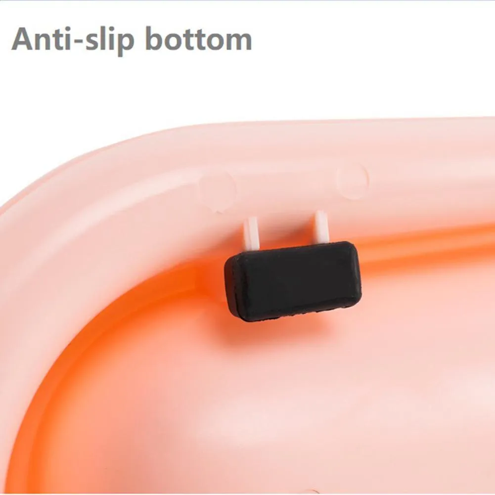 Green dual-compartment pet bowl with removable stainless steel insert and non-slip silicone base