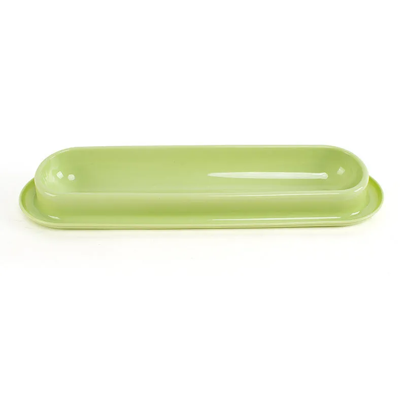 Green dual-compartment pet bowl with removable stainless steel insert and non-slip silicone base