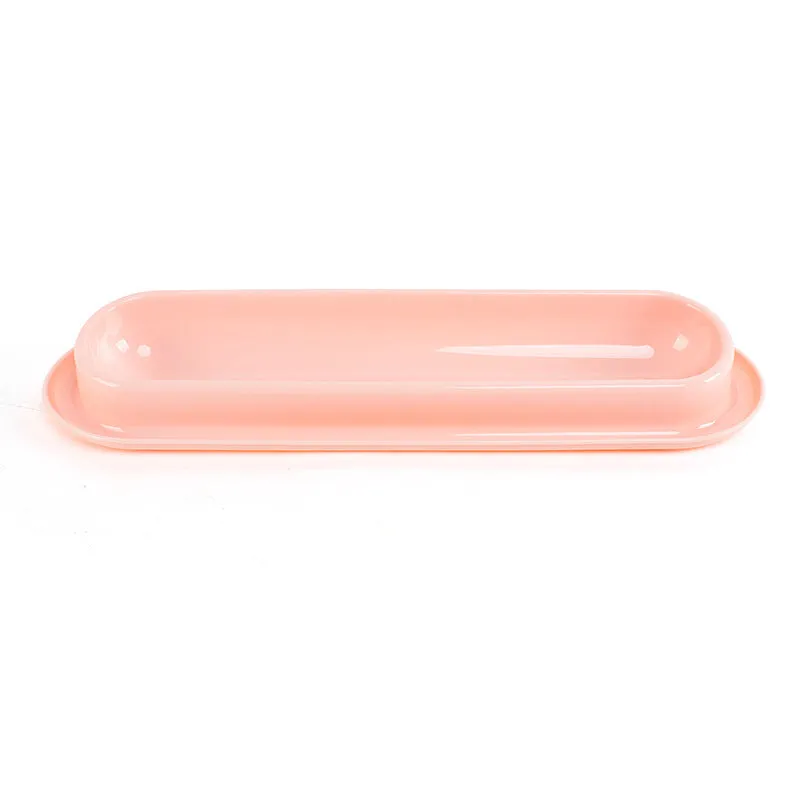 Green dual-compartment pet bowl with removable stainless steel insert and non-slip silicone base