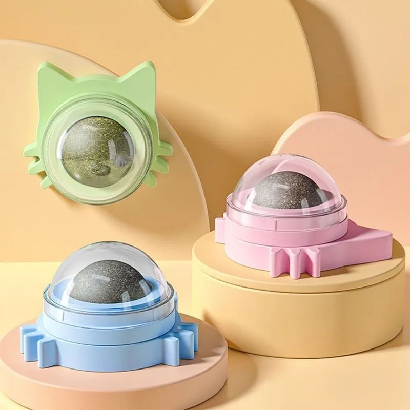 Colourful rotating catnip ball wall toy with edible mint material in cat face shape