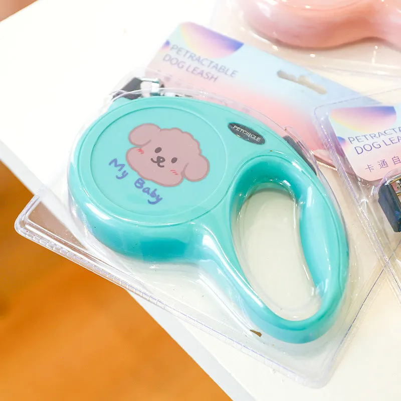 Plastic retractable dog leash 5 metres long cartoon design in blue, pink, and yellow colours
