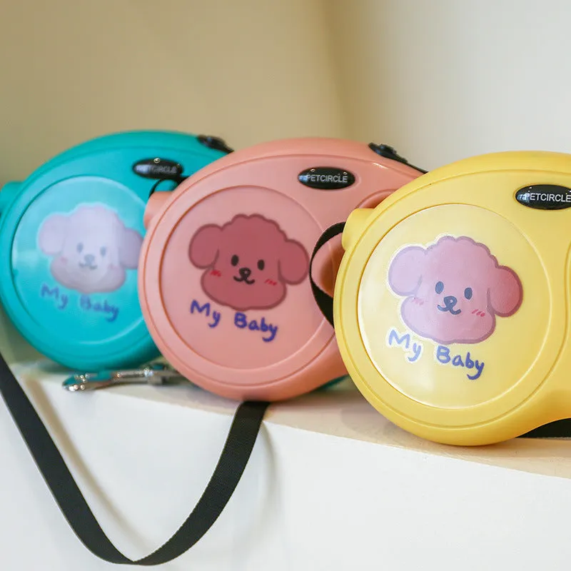Plastic retractable dog leash 5 metres long cartoon design in blue, pink, and yellow colours