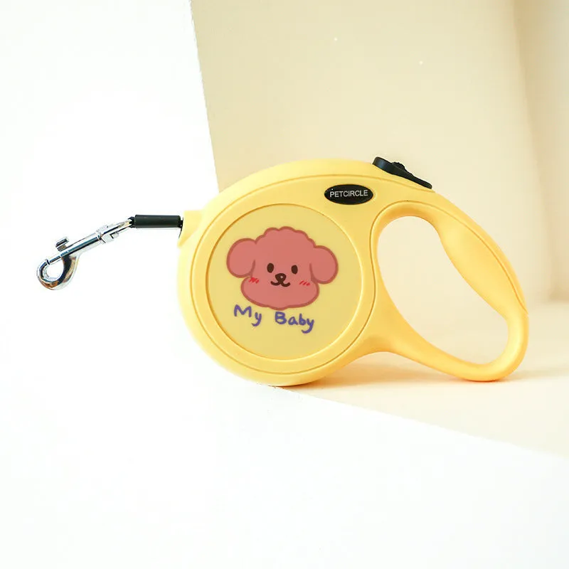 Plastic retractable dog leash 5 metres long cartoon design in blue, pink, and yellow colours