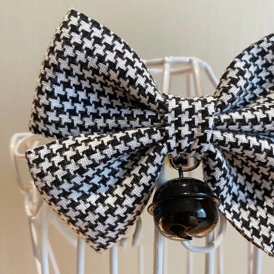 Cloth pet bow tie decoration in wine red checkered pattern with bell on a cat collar