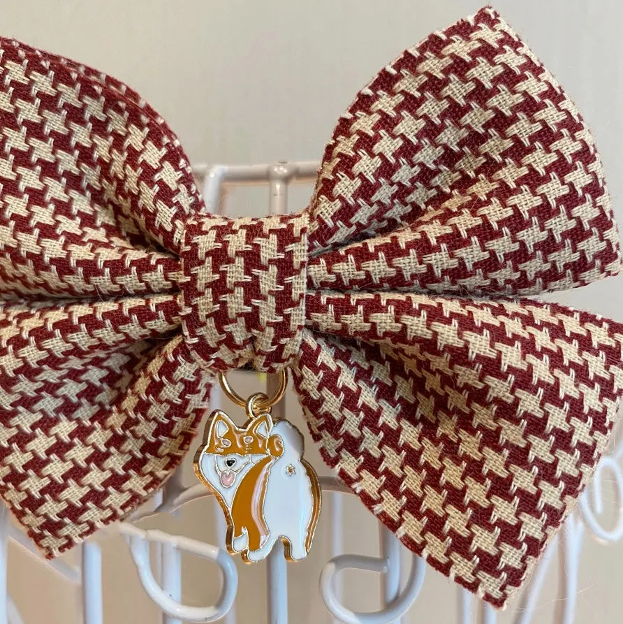Cloth pet bow tie decoration in wine red checkered pattern with bell on a cat collar