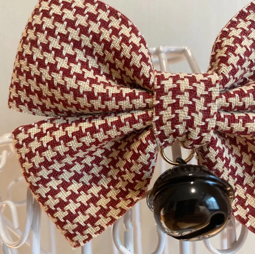Cloth pet bow tie decoration in wine red checkered pattern with bell on a cat collar