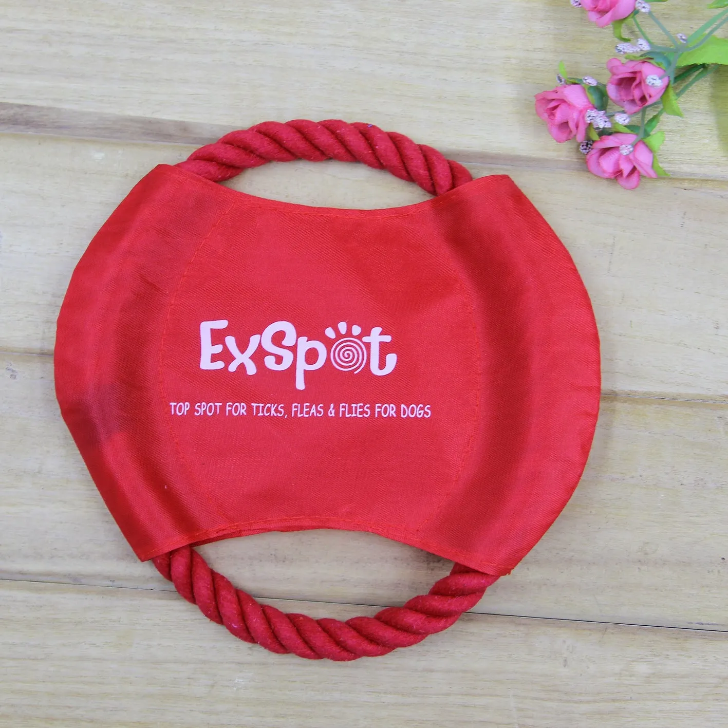 Canvas and rope dog flying disc toy 19cm diameter on grass for outdoor fetch