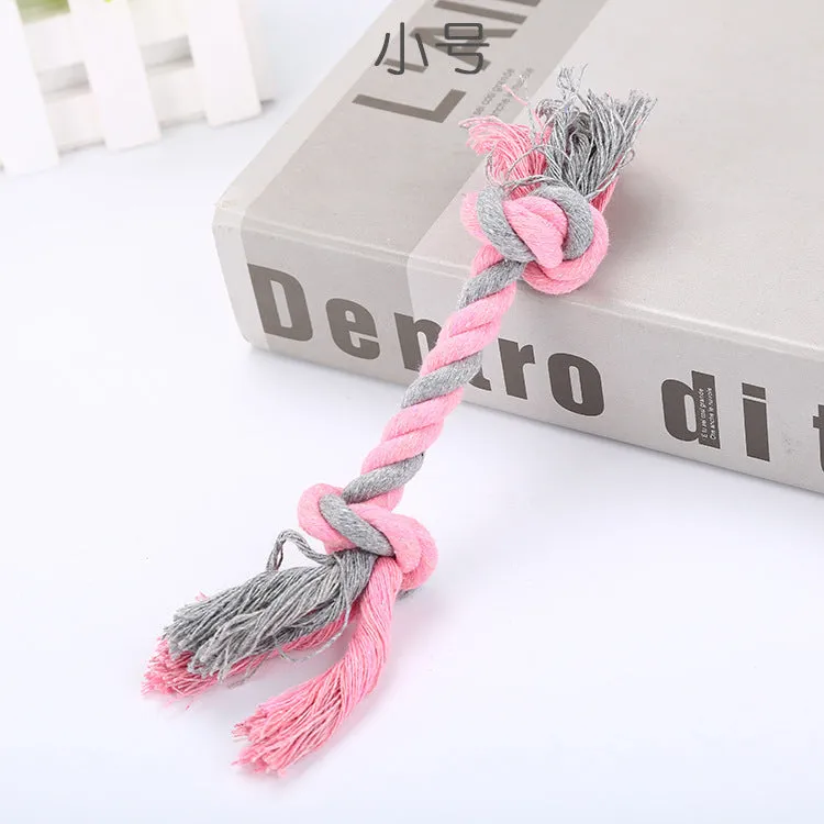 Cotton rope dog toy in medium size with braided texture, available in green, light blue, navy blue, pink, and yellow